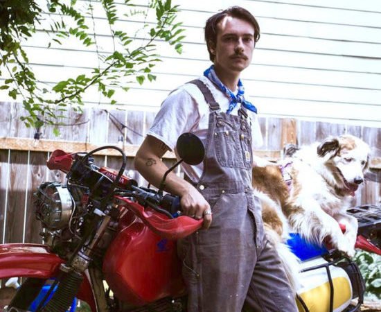 Artist Goth Babe posing with his dog Sadie